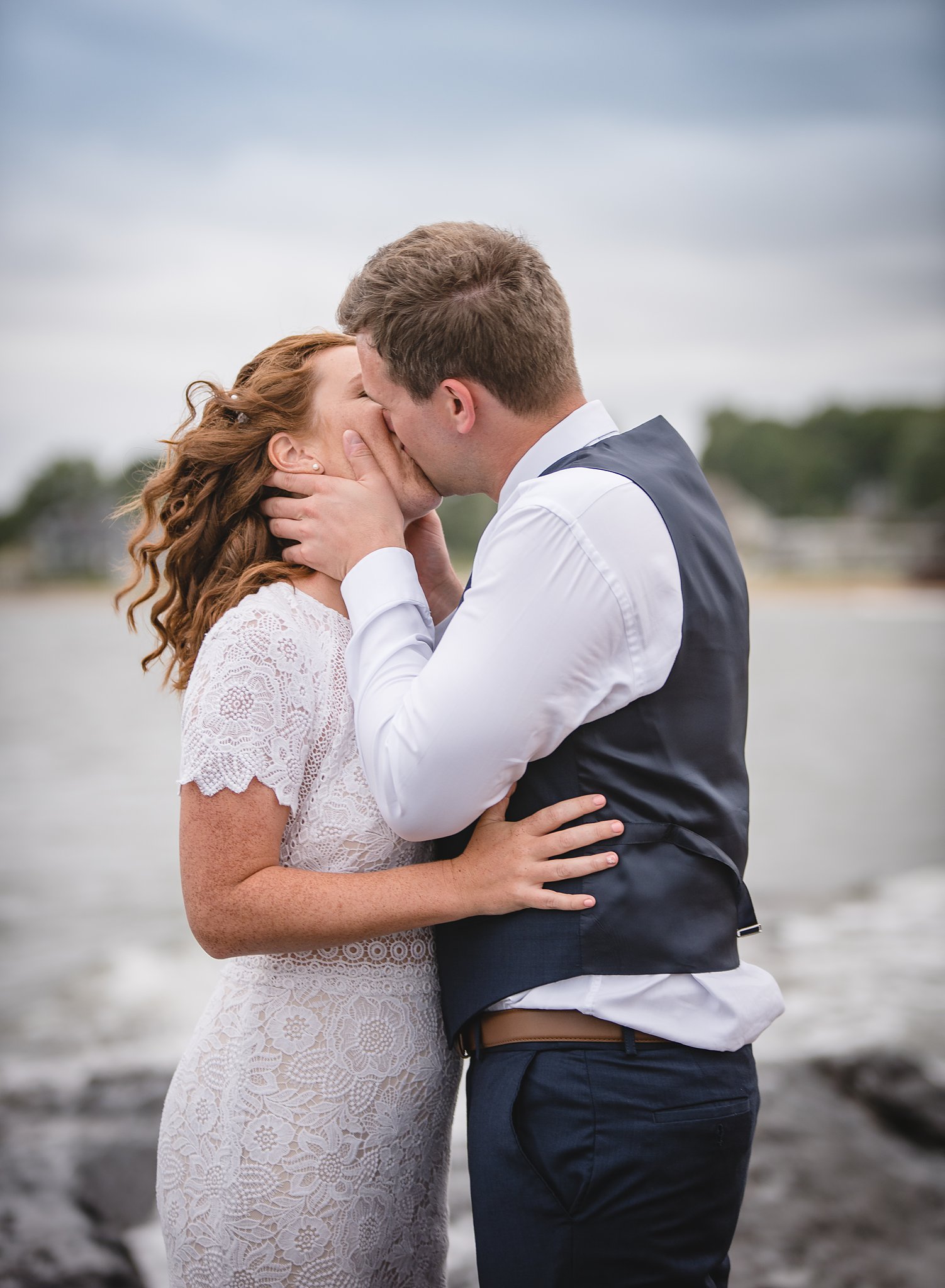 Connecticut beach wedding couple kissing